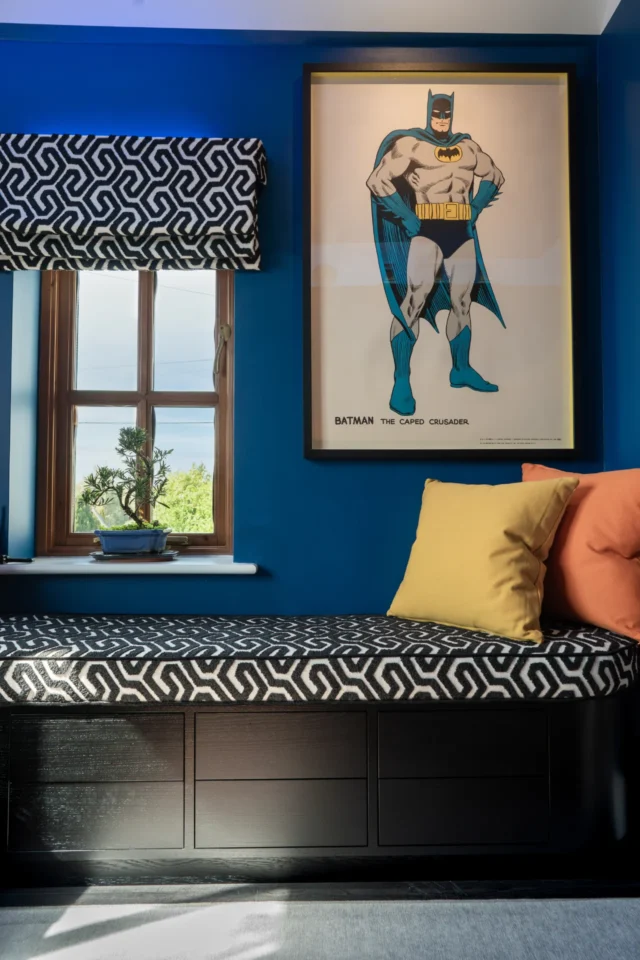 Home Office storage design showing matching upholstery with the window blinds